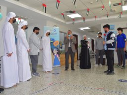 GR-12-Boys giving donation at Sharjah City for HumanitarianServices